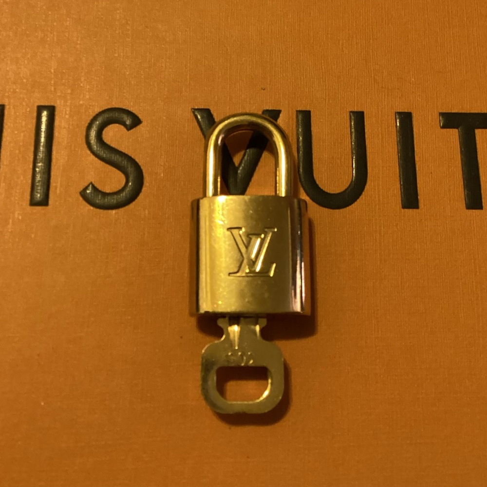 Authentic Louis Vuitton Padlock & key